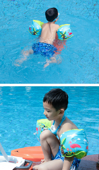 Child swimming with colorful parrot design inflatable armbands in blue pool.