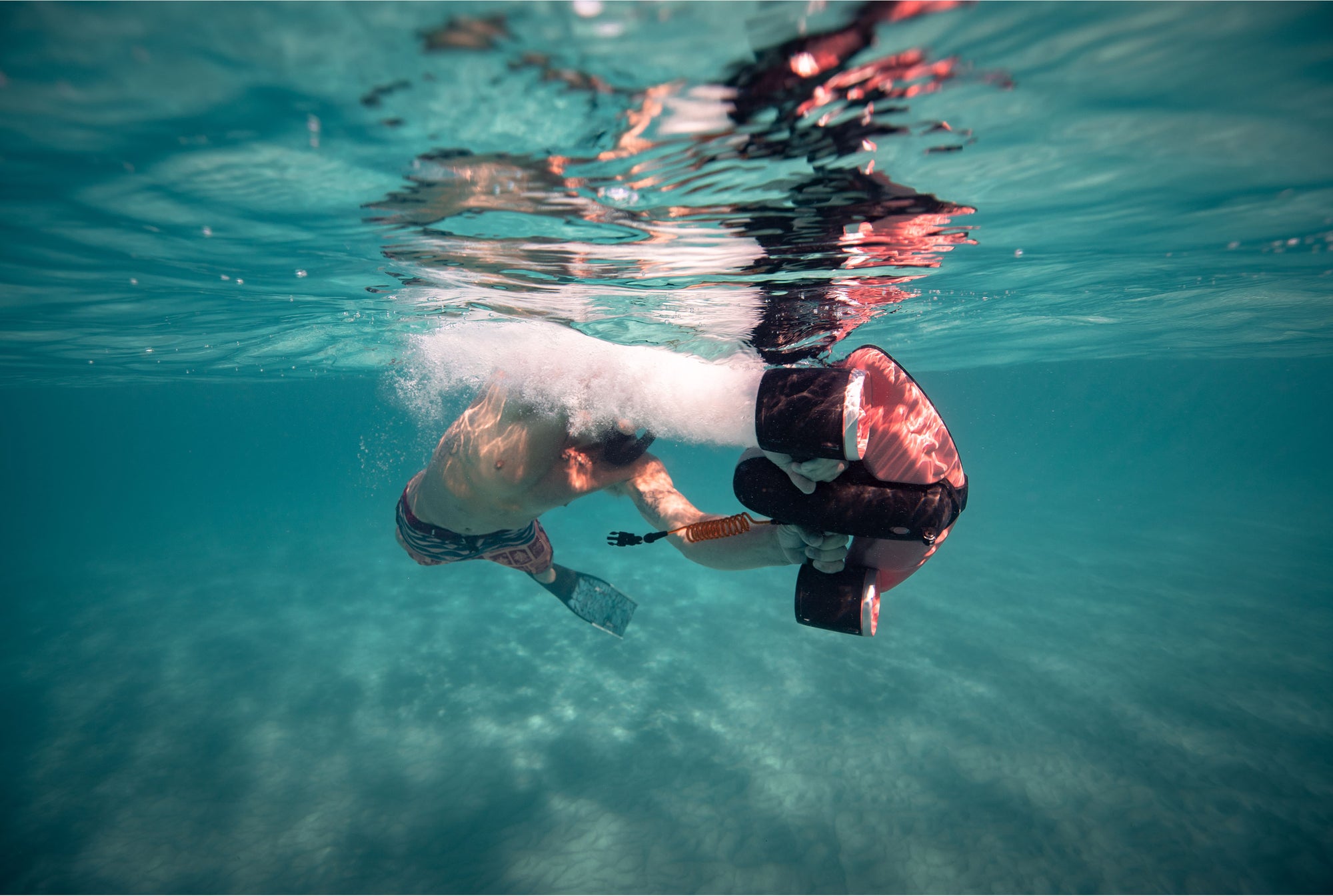 a man in a scuba gear underwater