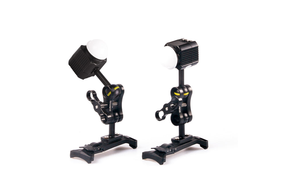 a pair of black camera lights