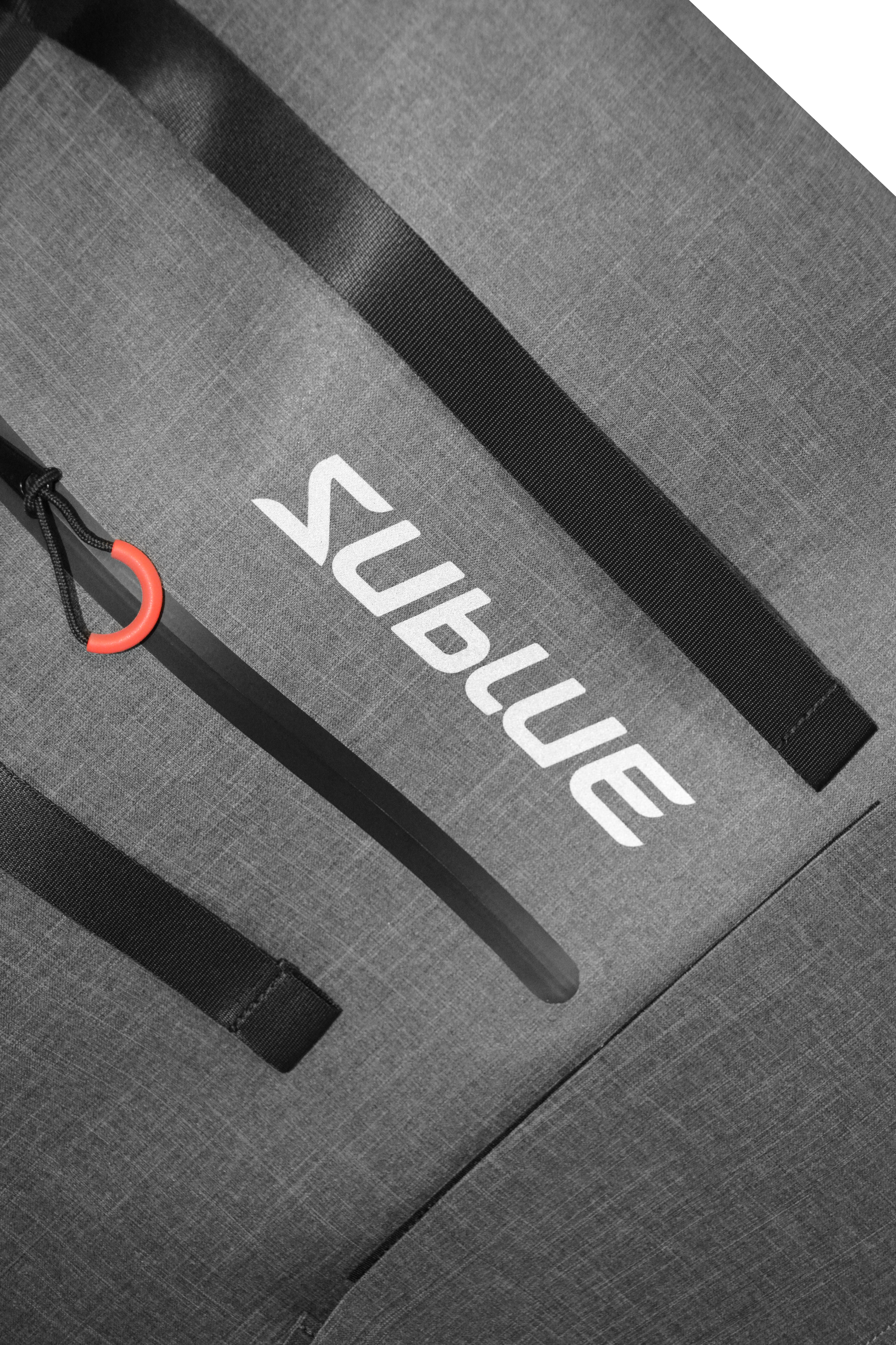 Close-up of Sublue waterproof backpack logo and straps.