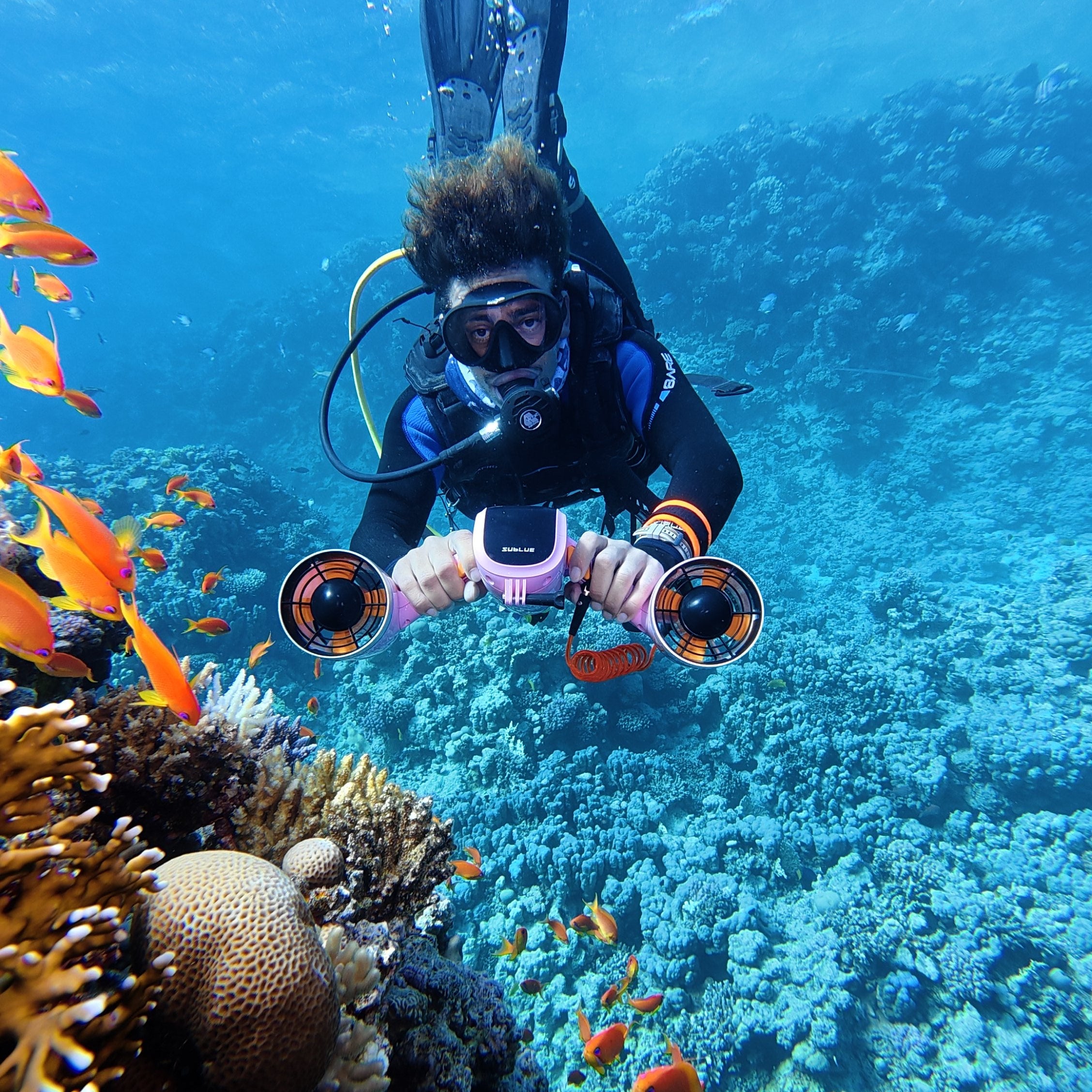 Sublue Mix 2026 dual-motor underwater scooter being used while diving
