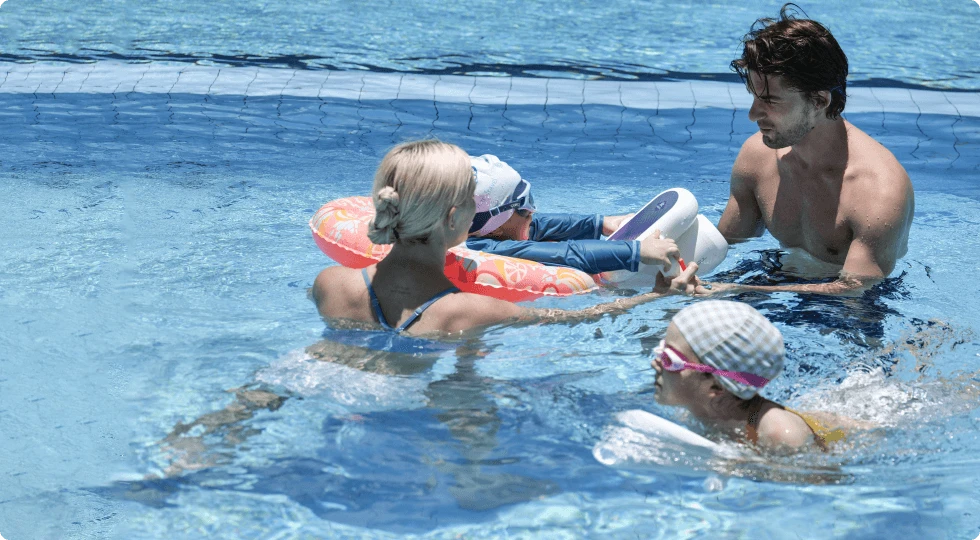 a group of people in a pool